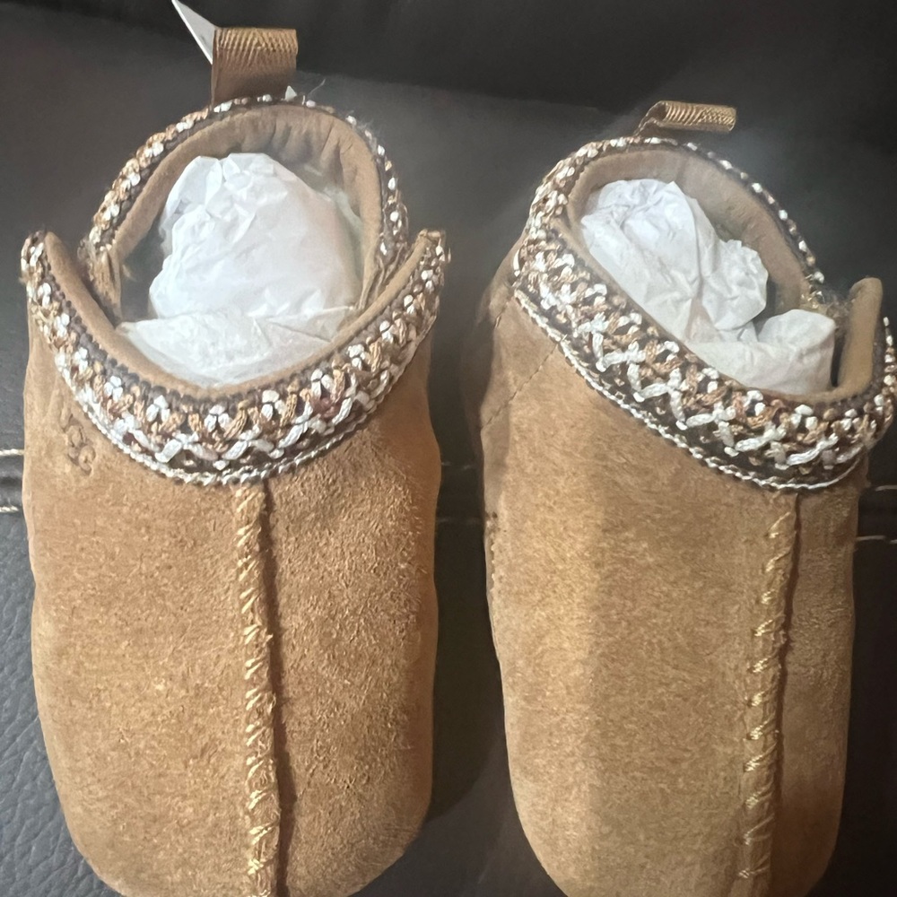 UGG Tan Kids Moccasins with Silver Trim